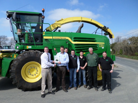 Pic of the Certified Dealer Specialisation Award being presented at TAG Narberth by John Deere Territory Manager, Darren Roe, to TAG Narberth Branch Manager, Matthew Blackburn.